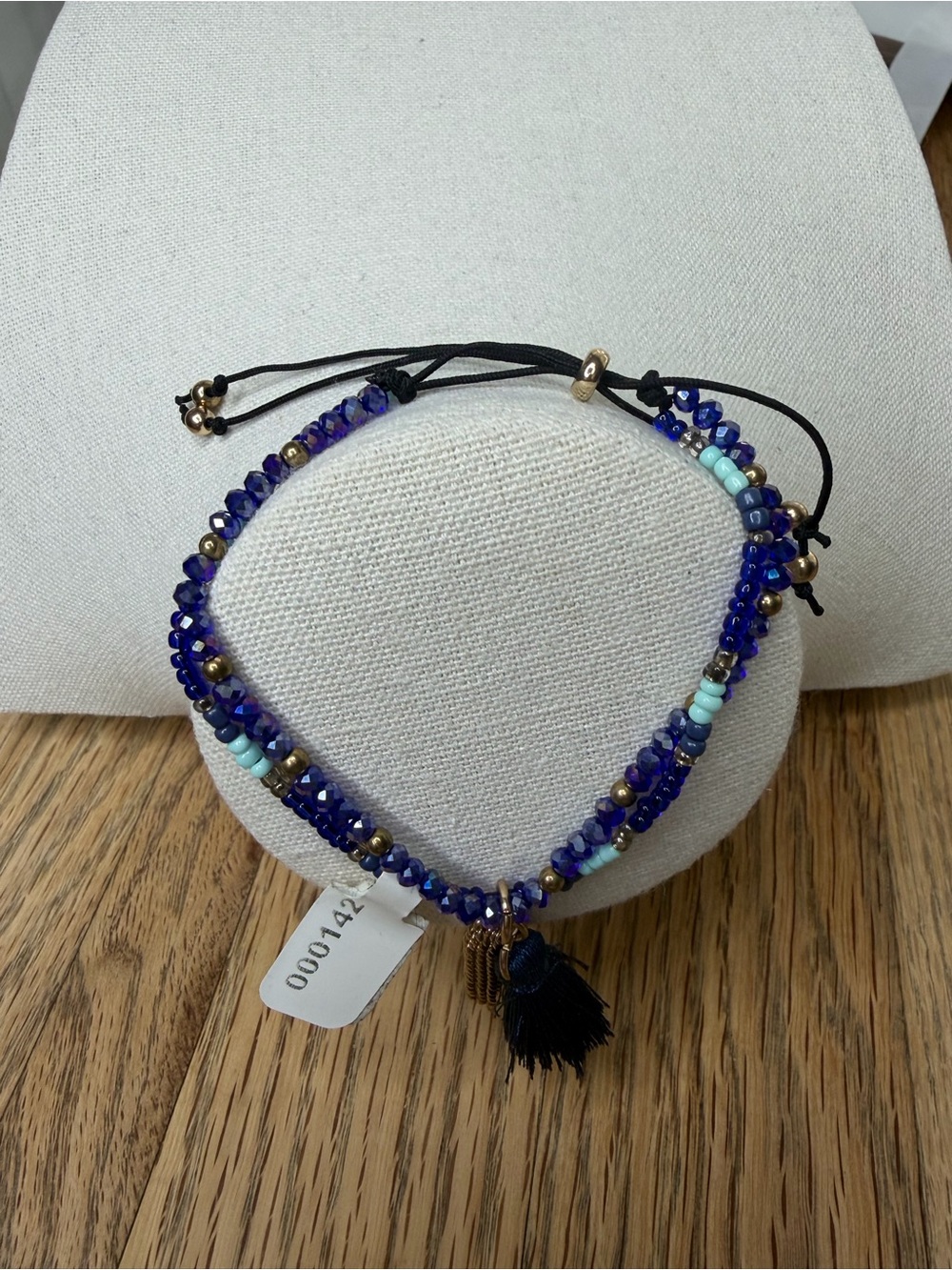 Adjustable Blue Beaded Bracelet with Gold Accents and Navy Tassel